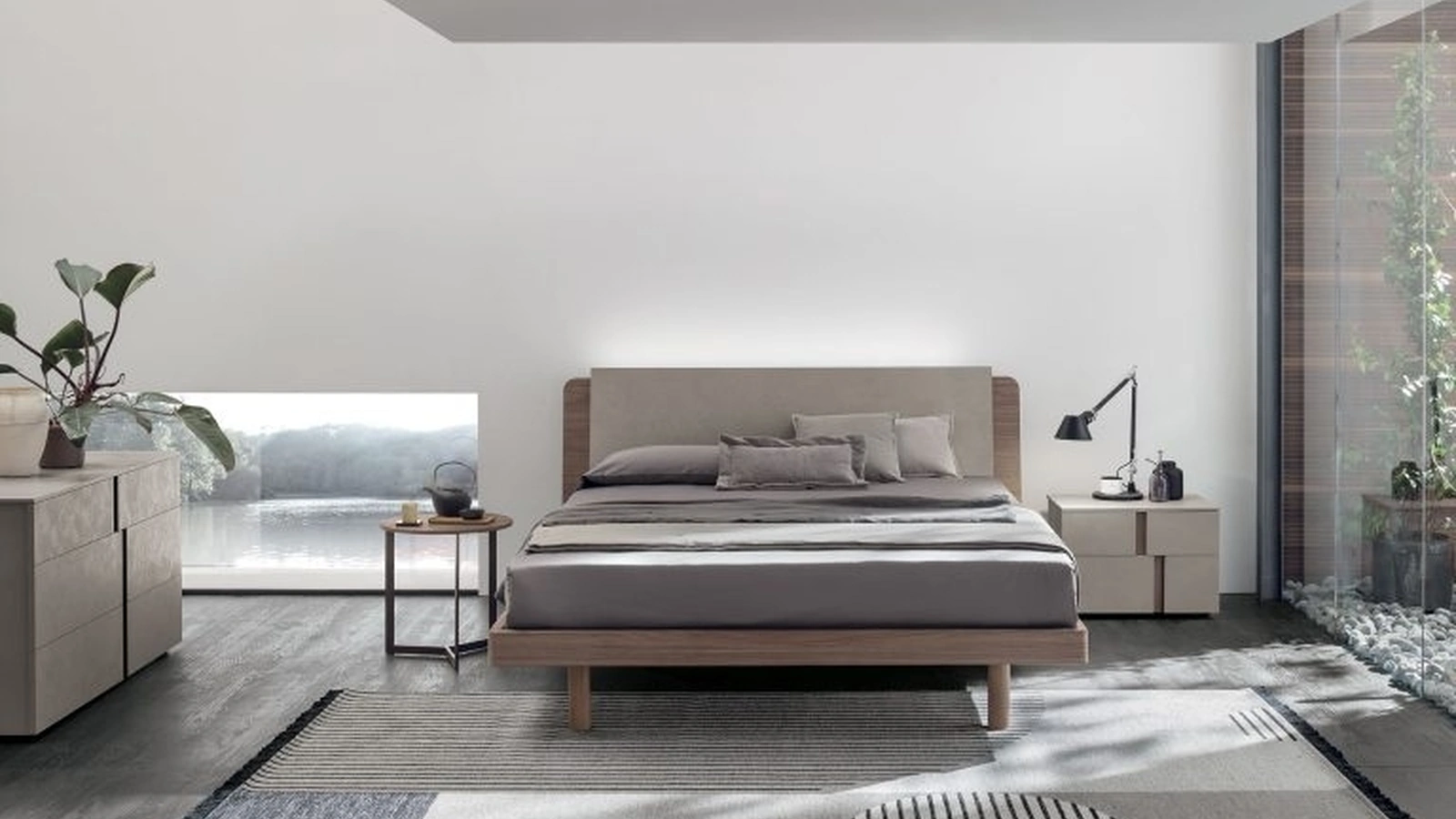 Letto in materico noce ambra e materico cemento cava con testiera Roxy di Tomasella