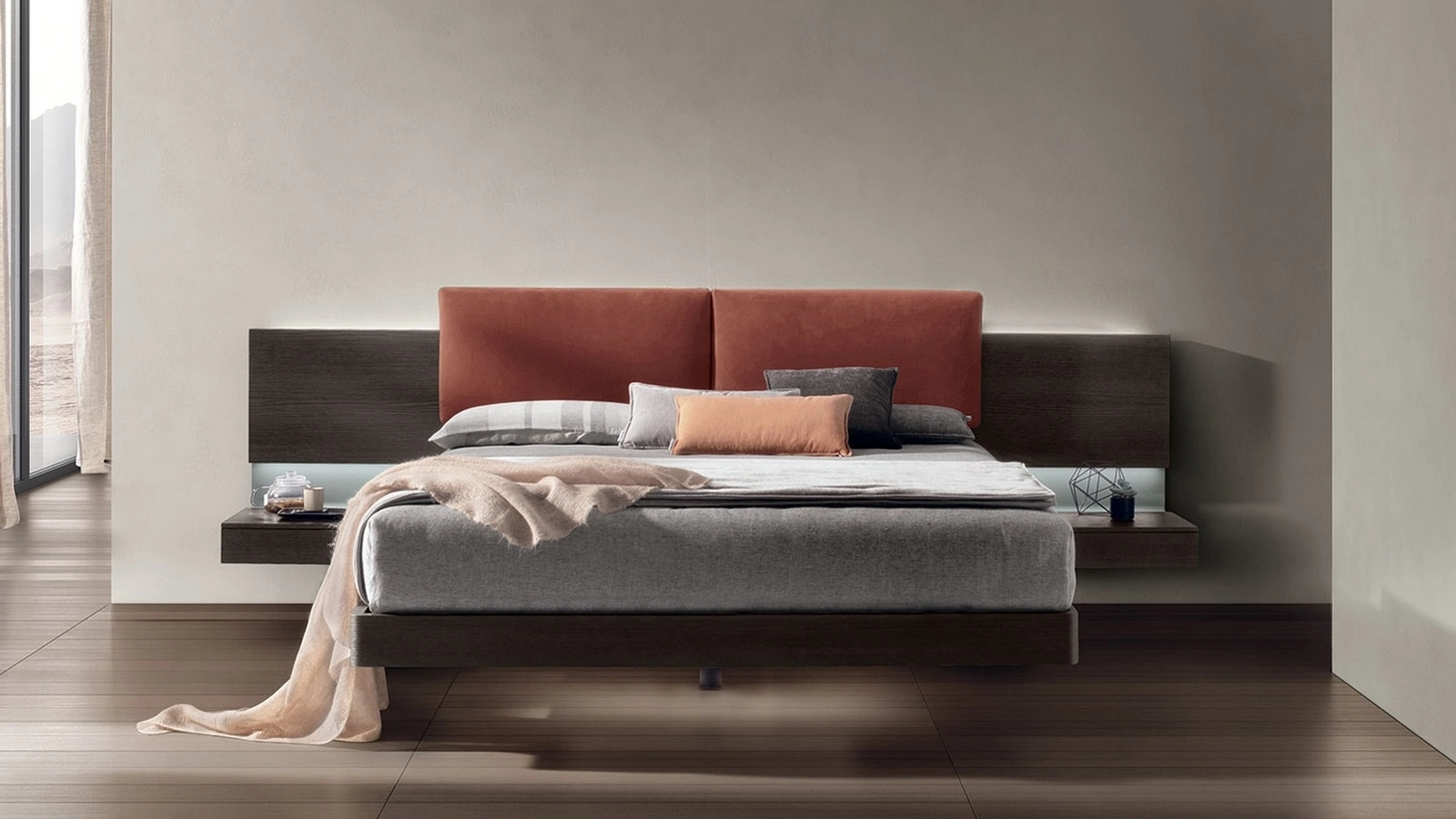 Letto in materico rovere moka con testiera in pelle imbottita Shiro di Tomasella