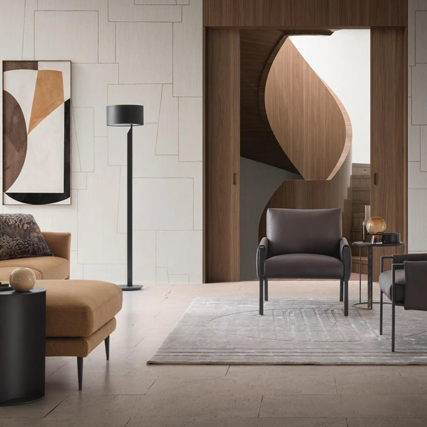 Poltroncina Andy in ecopelle con struttura in metallo di Le Comfort