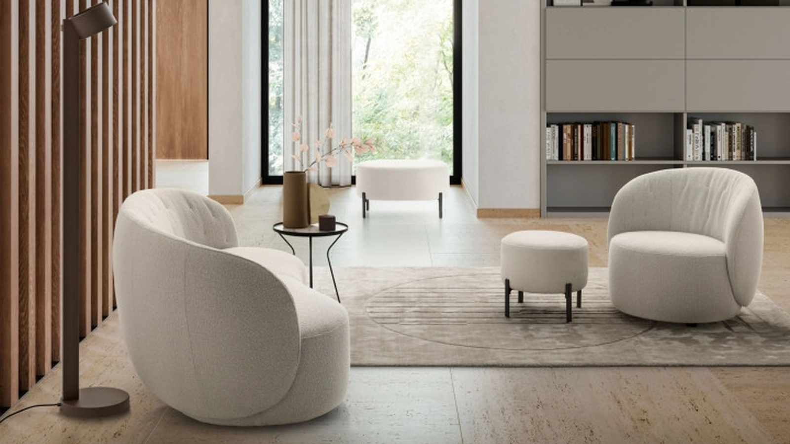 Poltroncina in tessuto dalle forme morbide e tondeggianti Moby di Le Comfort